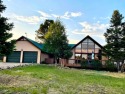Wonderful opportunity to own this 3 Bedroom / 3 Bath Chalet for sale in Angel Fire New Mexico Colfax County County on GolfHomes.com
