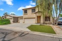 Welcome to this spacious two-story home that has it all! From for sale in San Tan Valley Arizona Pinal County County on GolfHomes.com