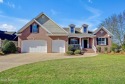 A custom-built brick home by Jernigan Homes located on a corner for sale in Leland North Carolina Brunswick County County on GolfHomes.com