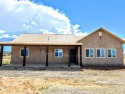 Home under construction soon to be completed in the beautiful for sale in Ranchos de Taos New Mexico Taos County County on GolfHomes.com
