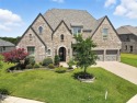 Backed by sweeping golf course views and designed with both for sale in Argyle Texas Denton County County on GolfHomes.com