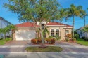 BRAND NEW ROOF /gutters on Fab Water view/Natural Preserve in for sale in Parkland Florida Broward County County on GolfHomes.com