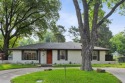Welcome to this beautifully renovated Mid-Century Ranch on a for sale in Dallas Texas Dallas County County on GolfHomes.com