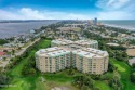 WHEN THE ARCHITECTURE AND THE DESIGN OF A CONDOMINIUM HOME BLURS for sale in Daytona Beach Shores Florida Volusia County County on GolfHomes.com