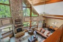 Awesome custom-built 1.5 story Lindal Cedar Home on wooded Golf for sale in Holly Lake Ranch Texas Wood County County on GolfHomes.com