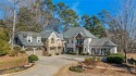 Nestled on the prestigious 8th Green of Atlanta Country Club for sale in Marietta Georgia Cobb County County on GolfHomes.com