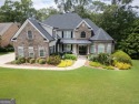Golf Course Living with Water Views. Luxury and Comfort on the for sale in Covington Georgia Newton County County on GolfHomes.com