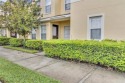 Beautiful 2 Bedroom/2.5 Bath Townhome with Office in Gated for sale in Lakeland Florida Polk County County on GolfHomes.com