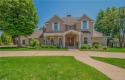 Tucked within the prestigious gated Pinnacle Country Club for sale in Rogers Arkansas Benton County County on GolfHomes.com