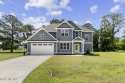 Absolute stunner situated on the 8th hole in Rock Creek!  This 5 for sale in Jacksonville North Carolina Onslow County County on GolfHomes.com