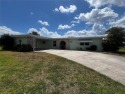 This Adorable Pool Home is located at the end of a cul-de-sac on for sale in Port Charlotte Florida Charlotte County County on GolfHomes.com