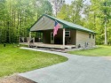 Welcome to your Lakewood retreat! Situated on 1.5 scenic acres for sale in Lakewood Wisconsin Oconto County County on GolfHomes.com