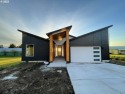 Beautiful new construction contemporary home next to a golf for sale in Cathlamet Washington Wahkiakum County County on GolfHomes.com