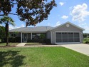 LOVELY GOLF COURSE PROPERTY with a long driveway, on a large .33 for sale in Dunnellon Florida Marion County County on GolfHomes.com