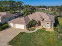 Step into your dream home, where luxury meets comfort in this for sale in Port Orange Florida Volusia County County on GolfHomes.com