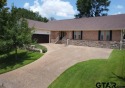 Prepare to be impressed! Nestled behind the private gates of the for sale in Bullard Texas Smith County County on GolfHomes.com