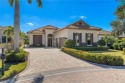 Nestled in prestigious Miromar Lakes, immaculate lakefront 2018 for sale in Miromar Lakes Florida Lee County County on GolfHomes.com