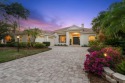 This exquisite four-bedroom home is majestically situated on the for sale in University Park Florida Manatee County County on GolfHomes.com