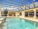 Exquisite Luxury Home WITH GUEST COTTAGE AND SEPARATE IN-LAW for sale in Port Orange Florida Volusia County County on GolfHomes.com