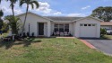 The seller is having a NEW ROOF installed in a few weeks. You for sale in Lake Worth Florida Palm Beach County County on GolfHomes.com