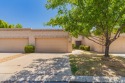 Welcome to this delightful 2-bedroom townhome with a roomy 2-car for sale in Peoria Arizona Maricopa County County on GolfHomes.com