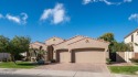 Welcome to this stunning TW Lewis single-level home in Laguna for sale in Chandler Arizona Maricopa County County on GolfHomes.com