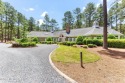 Overlooking the 7th green of Pinewild's Magnolia Course, this for sale in Pinehurst North Carolina Moore County County on GolfHomes.com