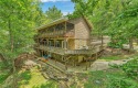 Live like you are on vacation year round!  Nestled in the for sale in Traphill North Carolina Wilkes County County on GolfHomes.com