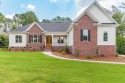 This brand new ranch home from IDK HOMES features a warm for sale in Aiken South Carolina Aiken County County on GolfHomes.com