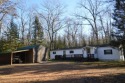 Looking for a great getaway for fun in the Northwoods? Here is a for sale in Saint Germain Wisconsin Vilas County County on GolfHomes.com