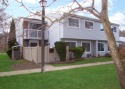 Three bedroom, one and a half bath townhome with courtyard views for sale in Holbrook New York Suffolk County County on GolfHomes.com