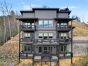 Welcome to this pristine 3 story modern cabin in the highly for sale in Gatlinburg Tennessee Sevier County County on GolfHomes.com