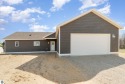 Must see brand new home by Rourke Builders!!  Located on the for sale in Oscoda Michigan Iosco County County on GolfHomes.com