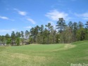 Beautiful level lot on #17 green of Ponce de Leon golf course for sale in Hot Springs Village Arkansas Saline County County on GolfHomes.com