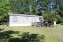Affordable 3BDR/2BA single-wide manufactured home on one acre for sale in Shallotte North Carolina Brunswick County County on GolfHomes.com