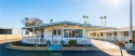 Step into this spacious triple-wide home in the 55+ community of for sale in Hemet California Riverside County County on GolfHomes.com