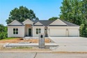 Welcome to this exquisite 3,343 sqft home, offering 5 spacious for sale in Pea Ridge Arkansas Benton County County on GolfHomes.com