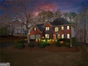 Welcome home to this timeless brick traditional nestled at the for sale in Acworth Georgia Cobb County County on GolfHomes.com