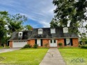 Spacious home in Country Club area!  This two story French for sale in Houma Louisiana Terrebonne Parish County on GolfHomes.com