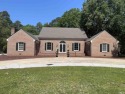 Located in the Chicora Club Golf community, this sprawling all for sale in Dunn North Carolina Harnett County County on GolfHomes.com
