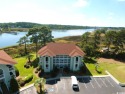Imagine watching the Christmas Boat Regatta from the comfort and for sale in Little River South Carolina Horry County County on GolfHomes.com