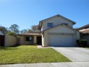 A solid two-story 4 bed/ 2.5 bath, 2 car garage, pool home is for sale in Tampa Florida Hillsborough County County on GolfHomes.com