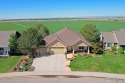 You will love this exquisite custom home located on a quiet for sale in Eaton Colorado Weld County County on GolfHomes.com