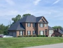 LAKE FRONT Stately Brick Colonial with 1st Floor Master. Five for sale in Danville Kentucky Boyle County County on GolfHomes.com