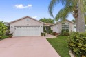 Luxuriously upgraded 3-bed, 2-bath lakefront home with over 1 for sale in Fort Pierce Florida Saint Lucie County County on GolfHomes.com