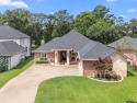 Enjoy serene views from your backyard on the green -- perfectly for sale in Tyler Texas Smith County County on GolfHomes.com