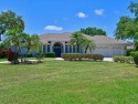 Nestled in the popular gated golf community of River Wilderness for sale in Parrish Florida Manatee County County on GolfHomes.com