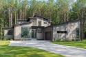 Welcome to ''The Fairway Rancher,'' a luxurious embodiment of for sale in Sandpoint Idaho Bonner County County on GolfHomes.com