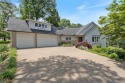 This exquisite custom home features breathtaking views of miles for sale in Holiday Island Arkansas Carroll County County on GolfHomes.com