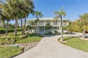 Welcome to 940 Sand Dune Drive, a peaceful retreat nestled in for sale in Marco Island Florida Collier County County on GolfHomes.com